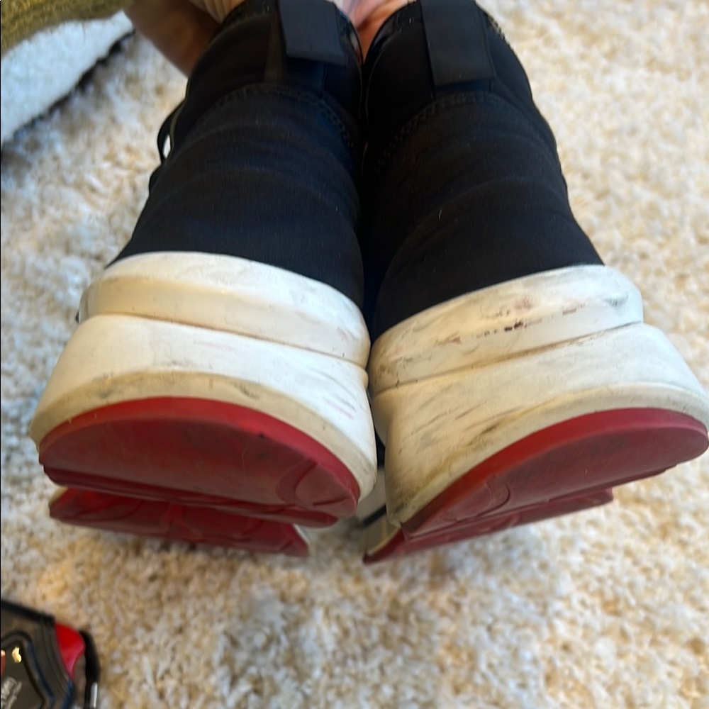 Authentic Christian Louboutin Black and Silver Studded Sneakers - Picture 8 of 11